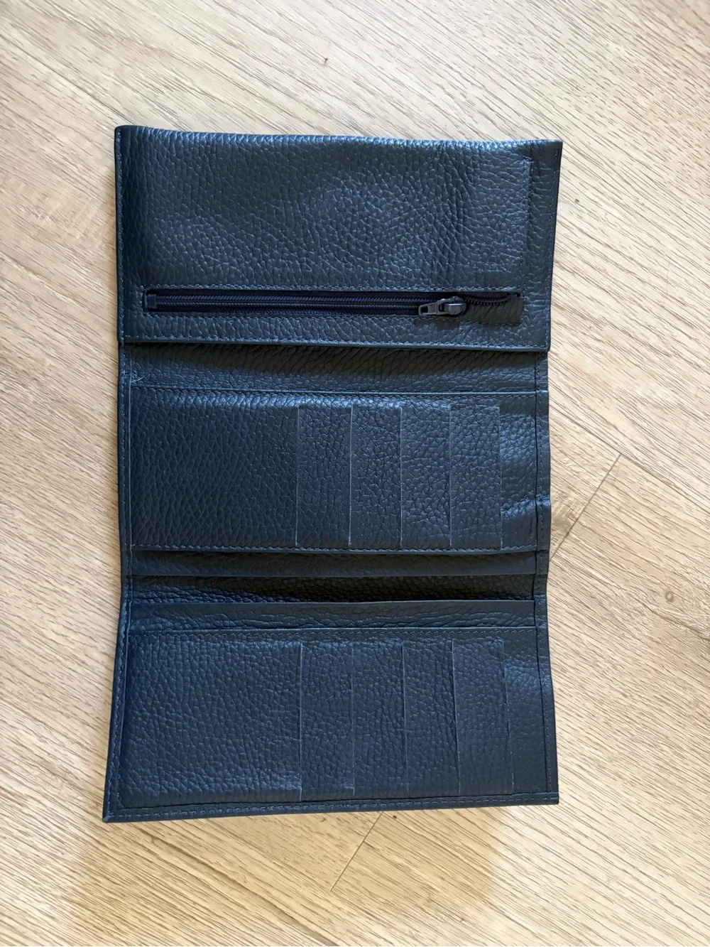 Classic Navy Blue Leather Women’s Wallet with Strap Closure